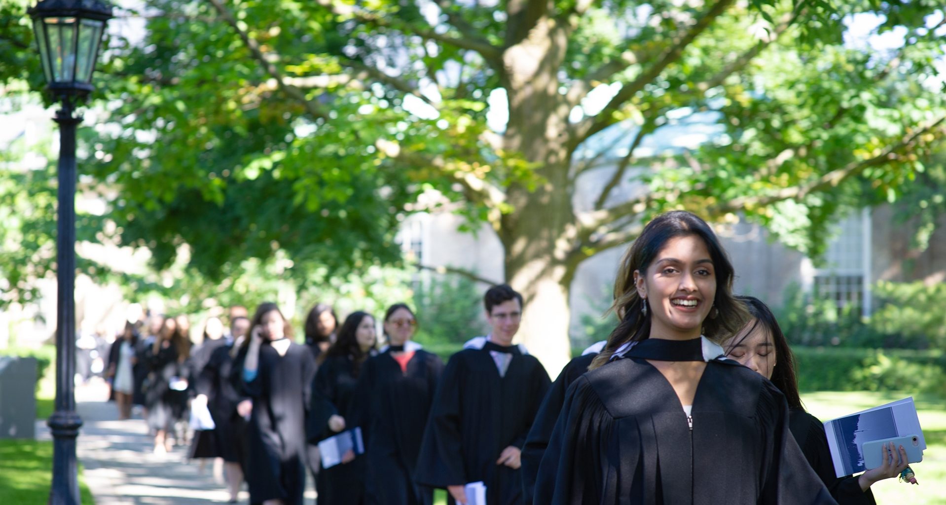 Graduands process to Convocation Hall for their Graduation Ceremony